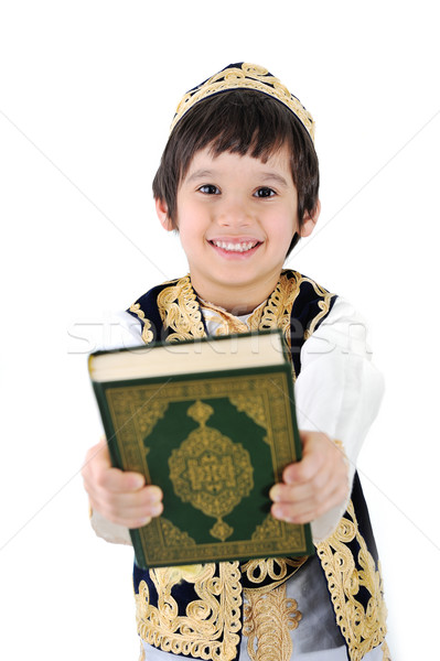 Happy muslim kid holding holy Quran Stock photo © zurijeta