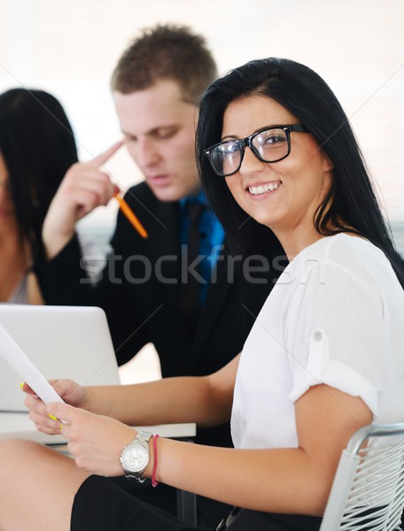 Image of confident colleagues communicating at meeting Stock photo © zurijeta
