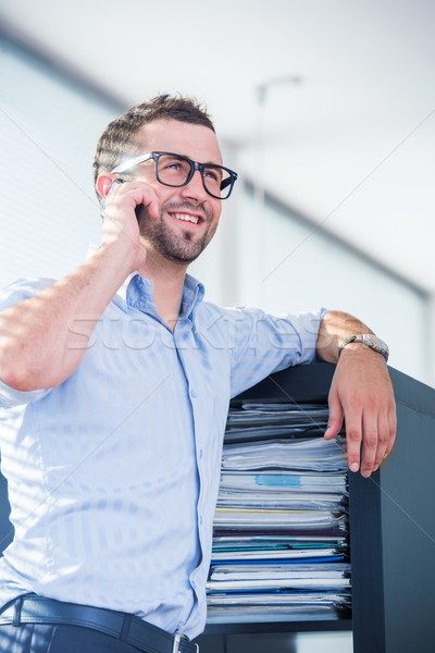 Happy corporate men with cellphone Stock photo © zurijeta