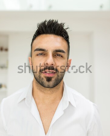 Handsome young man loudly yelling Stock photo © zurijeta
