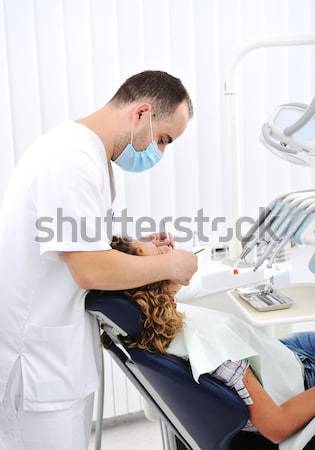 Stock photo: Man washing face in bathroom