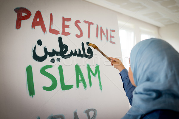 Arabic Muslim girl with Palestinian flag Stock photo © zurijeta