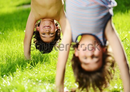 Stock photo: Group of happy children playing outdoors in spring park