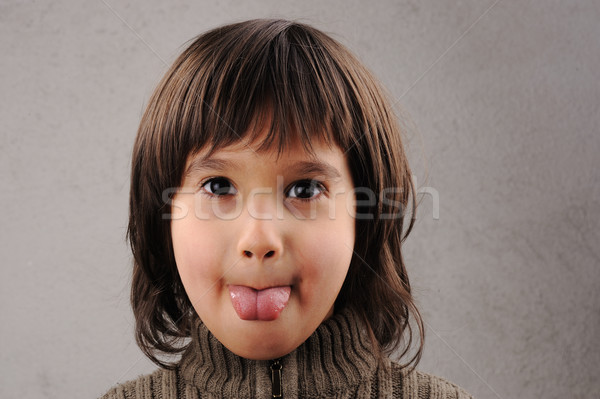 Schooljongen knap kid jaren oude gezichtsuitdrukkingen Stockfoto © zurijeta