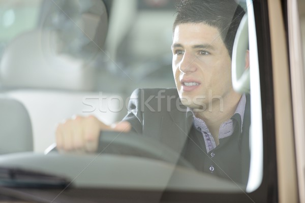 Businessman driving a car Stock photo © zurijeta