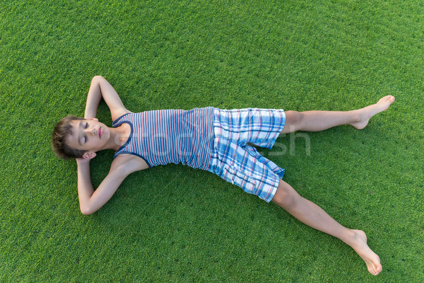 The best summer holiday vacation laying on perfect green grass Stock photo © zurijeta