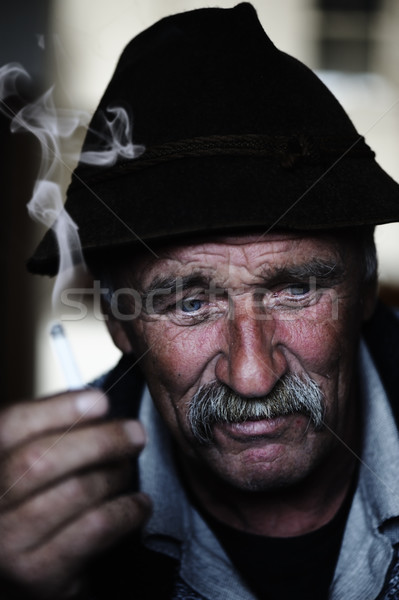 Közelkép művészi fotó kopott férfi szürke Stock fotó © zurijeta