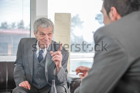 Business people talking  while boss is finger pointing Stock photo © zurijeta