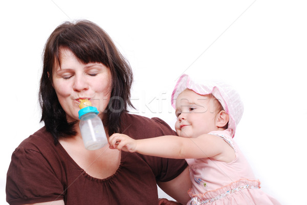 Mom is feeding her baby and vice versa Stock photo © zurijeta