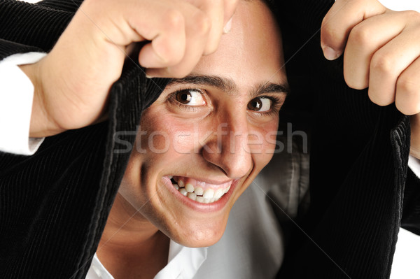 Portret jonge man hoofddoek jas glimlach Stockfoto © zurijeta