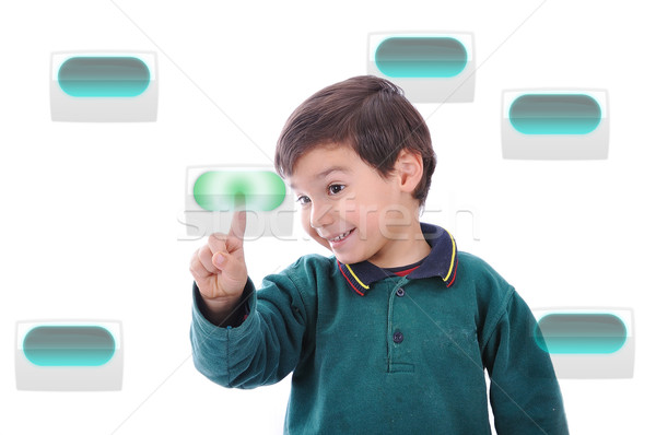 Little cute child pressing digital buttons on touchscreen, ideal for your concept Stock photo © zurijeta