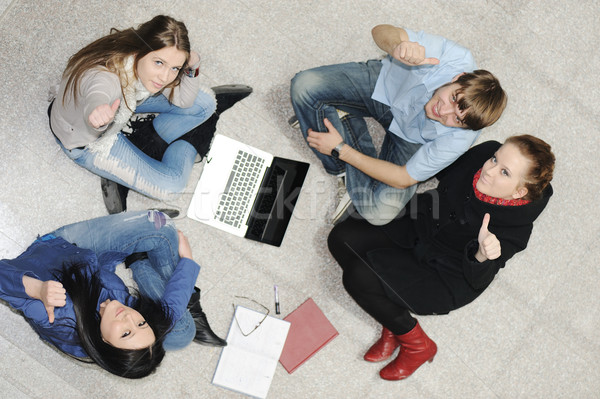 Creative group of students sitting and working together Stock photo © zurijeta