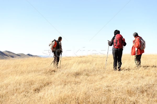 Sport hiking in mountains, walking and backpacking Stock photo © zurijeta