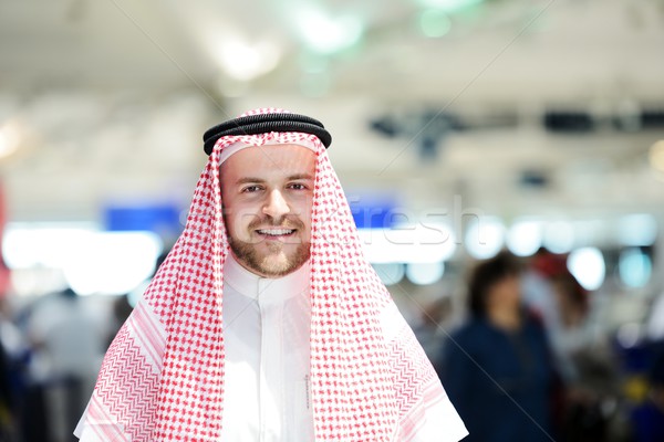 Modern Arabic businessman inside airplane Stock photo © zurijeta