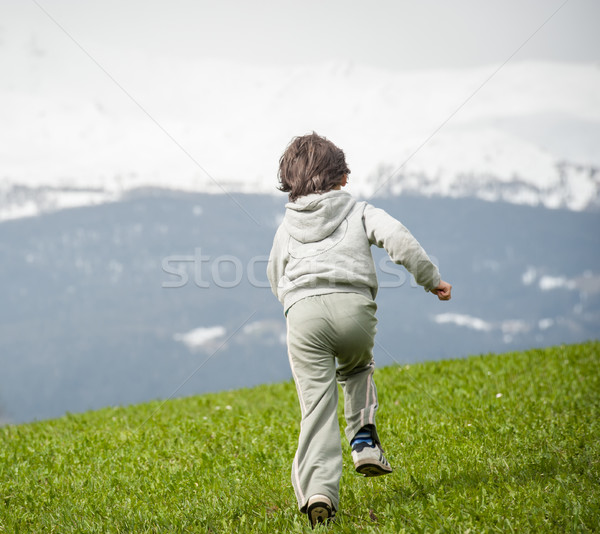 Fiú gyönyörű hegy legelő gyermek mező Stock fotó © zurijeta