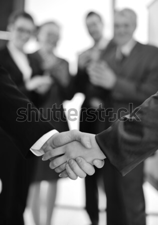 Handshake isolated on business background Stock photo © zurijeta