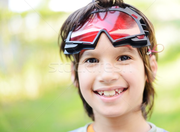 Kicsi gyerek játszik fiú arc boldog Stock fotó © zurijeta