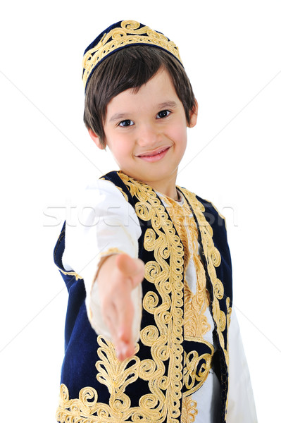 Cute middle-eastern child extending hand to shake Stock photo © zurijeta