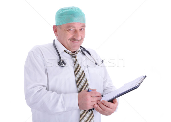 Positive elderly male doctor in characteristic clothes Stock photo © zurijeta