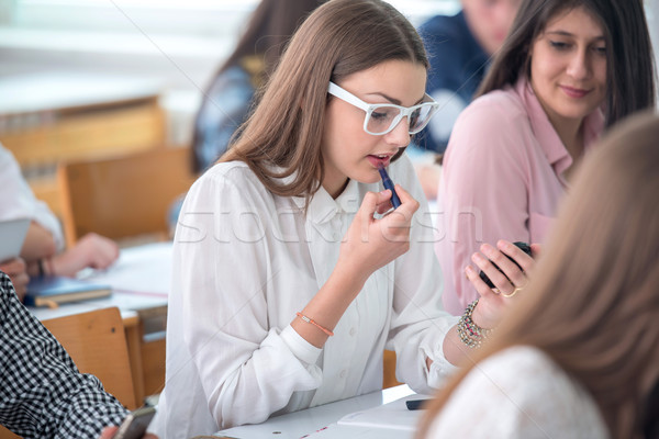 Schoolgirl applying makeup Stock photo © zurijeta