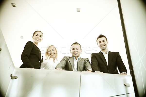 Fiiltered successful business people in real office situations Stock photo © zurijeta