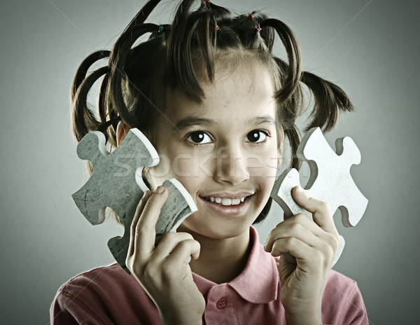 Gyerekek kapcsolódik kirakós játék üzlet arc absztrakt Stock fotó © zurijeta