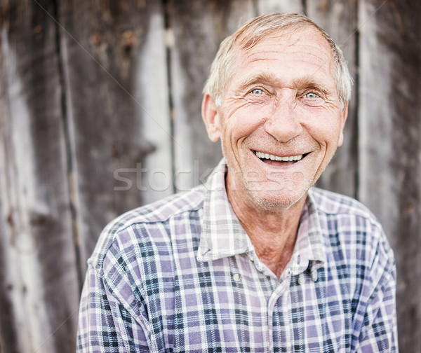 Glücklich lächelnd Holunder Senior Mann Porträt Stock foto © zurijeta