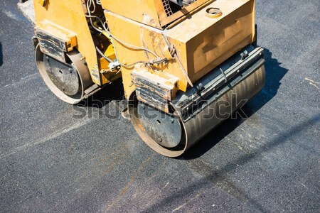 Hard work on asphalt construction Stock photo © zurijeta
