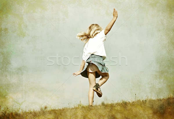 Filtered instagram image of a little kid on summer grass meadow  Stock photo © zurijeta