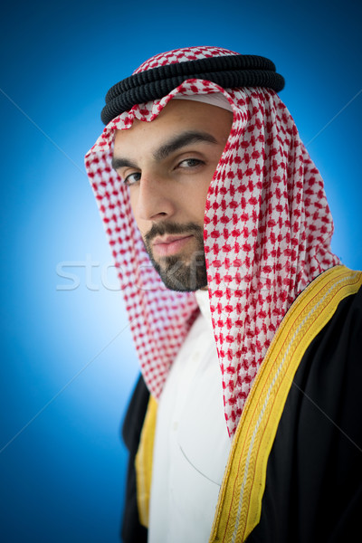 Retrato atraente Árabe homem robe árabe Foto stock © zurijeta
