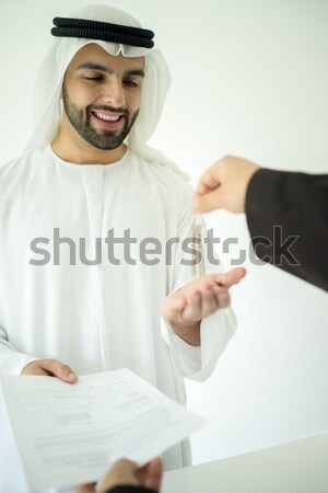 Stock photo: Arab man making successful deal