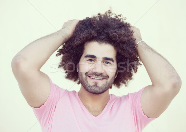 Retrato jovem atraente cara longo cabelos cacheados Foto stock © zurijeta