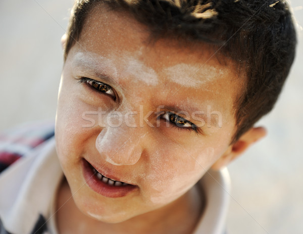 Portrait of poverty, little poor dirty boy, closeup Stock photo © zurijeta