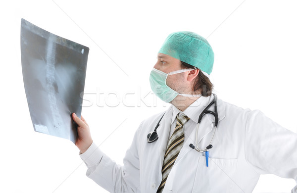 Young attractive male doctor in characteristic clothes Stock photo © zurijeta