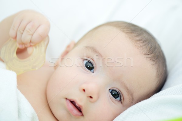 Imádnivaló baba fiú közelkép portré fehér Stock fotó © zurijeta
