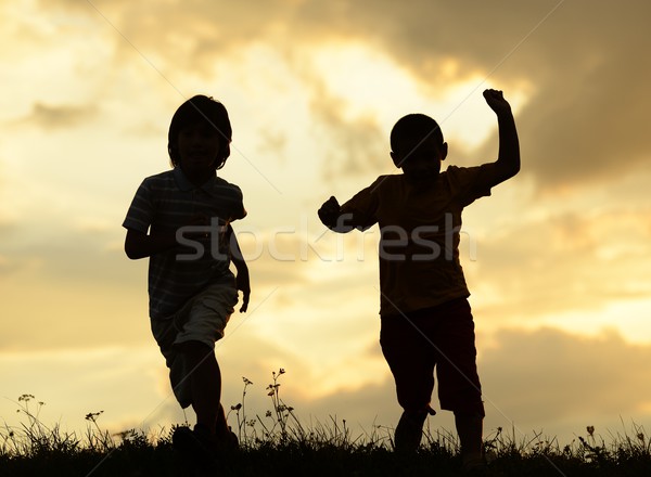 Bambini giocare sole estate tramonto attivo Foto d'archivio © zurijeta