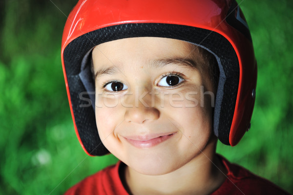 Little kid with biking safety helmet portrait Stock photo © zurijeta