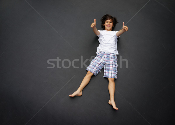 Kid jumping high up Stock photo © zurijeta