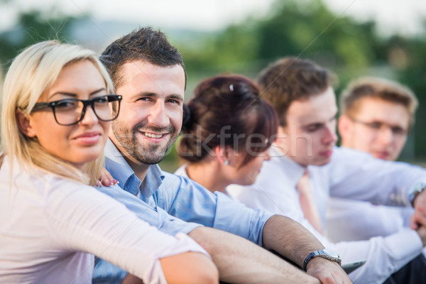 Five modern people sitting Stock photo © zurijeta
