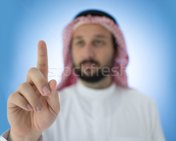Arabic people with finger up Stock photo © zurijeta
