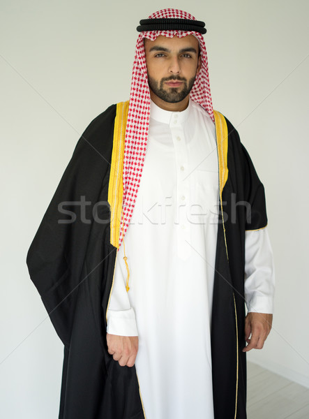 Retrato atraente Árabe homem robe árabe Foto stock © zurijeta