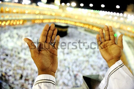 Muslim praying at Mekkah with hands up Stock photo © zurijeta