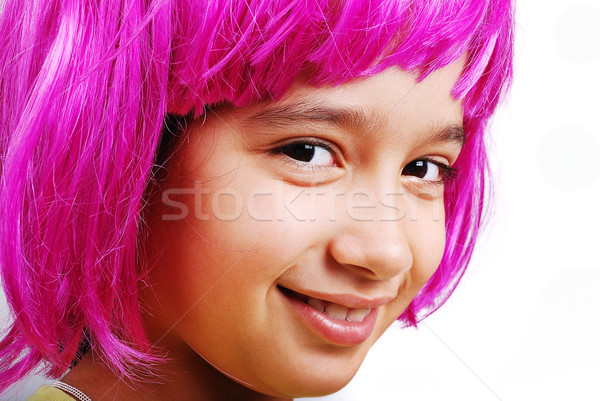 Adorable girl with pink hair and facial gesture Stock photo © zurijeta