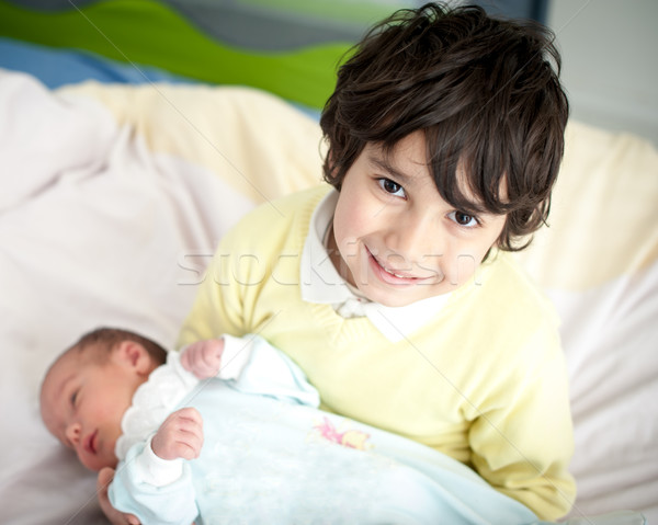 Newborn baby with bigger brother Stock photo © zurijeta