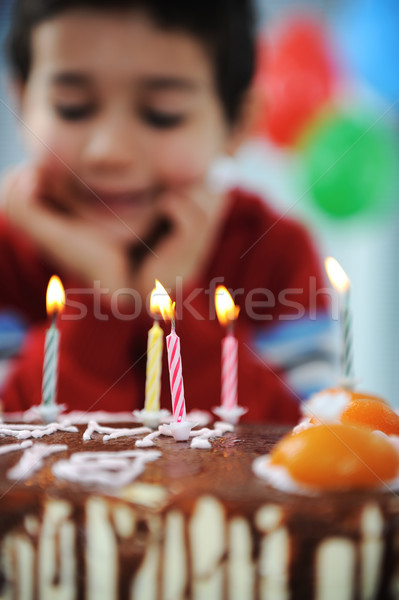 Fiú fúj gyertyák torta boldog születésnapot buli Stock fotó © zurijeta