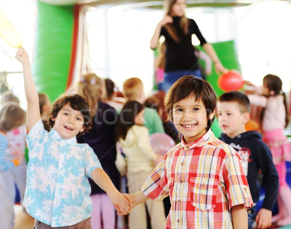 Kids playing on colorful kindergarden playground Stock photo © zurijeta