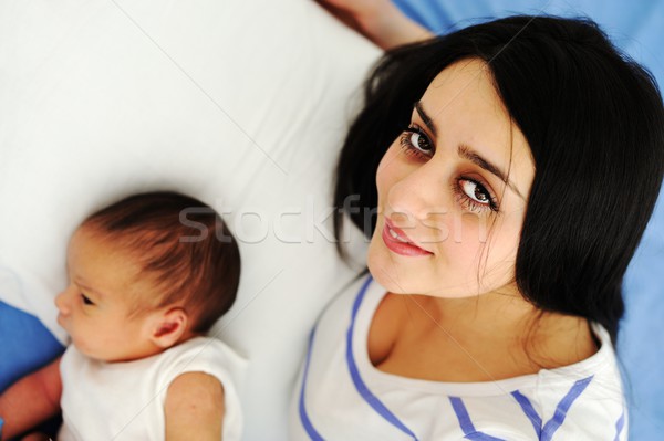 Middle eastern woman with her baby at hospital ro Stock photo © zurijeta