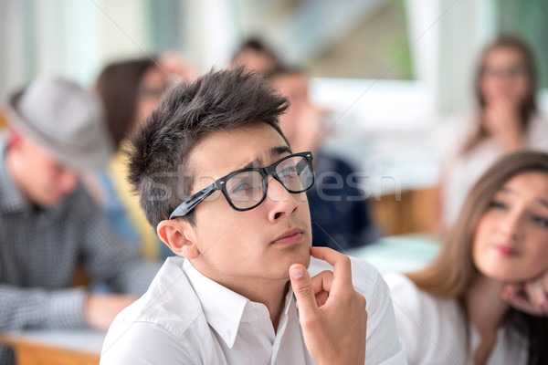 Student with glasses thinking Stock photo © zurijeta