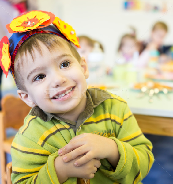 Stock photo: Little cute boy having birthday party at kindergarden