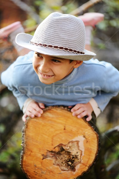 Boy portrait on tree outdoor in nature Stock photo © zurijeta
